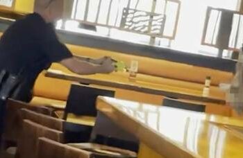 Mulher surtada e nua, quebra restaurante e é imobilizada com choque elétrico