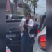 Vídeo: Mulher se estressa com fila de carros em frente de escola e sai apontando arma