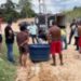 Peladeiros levantam caixa de água na Avenida das Flores e acham cadáver torturado