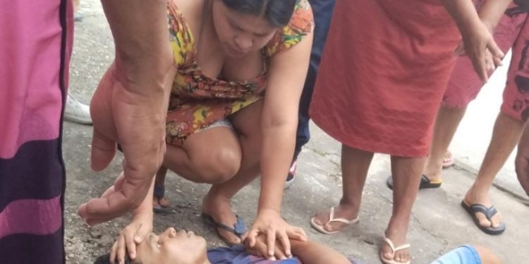 Vídeo: cristã ora na cabeça de homem baleado em Manaus