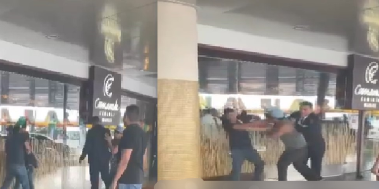 Vídeo: Funcionário leva socão após tentar abordar mulher na saída de loja em shopping de Manaus