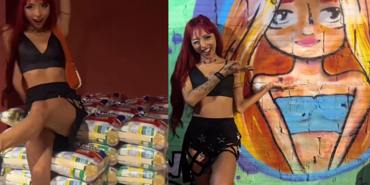 Exemplo: Ruivinha de Marte ganha desenho dela em beco no Coroado e presenteia moradores com cestas básicas