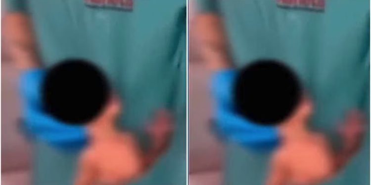 Fisioterapeuta causa revolta ao fazer dancinha com recém-nascido no bolso de jaleco
