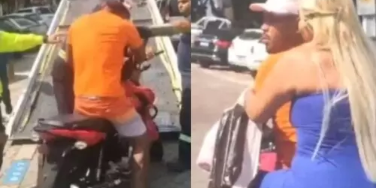 Sem capacete e de chinelo: motoqueiro abusado retira moto sem placa apreendida de cima de plataforma