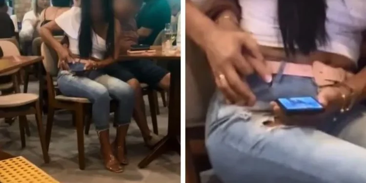 Vídeo: Mulher tenta desbloquear celular do marido após ele ficar bêbado e dormir em bar