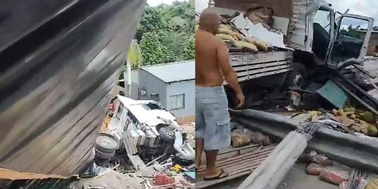 Vídeos urgentes: caminhão despenca e cai em cima de duas casas em Manaus