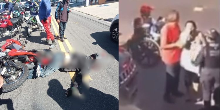 Esposa é consolada por policial após ver o marido morto em acidente em Manaus; vídeo