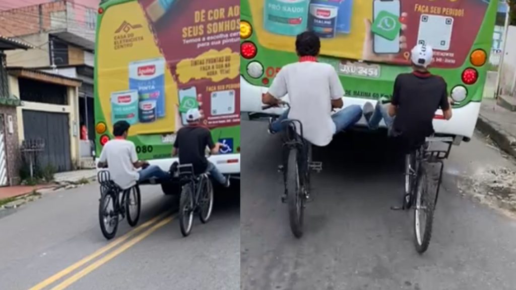 Vídeos: motoqueiro registra dois jovens andando de bike em Manaus com os pés presos em ônibus
