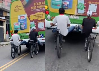 Vídeos: motoqueiro registra dois jovens andando de bike em Manaus com os pés presos em ônibus