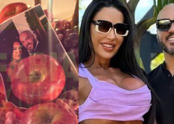 Pai de santo aparece fazendo 'amarração' com foto de Belo e Gracyanne