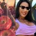 Pai de santo aparece fazendo 'amarração' com foto de Belo e Gracyanne