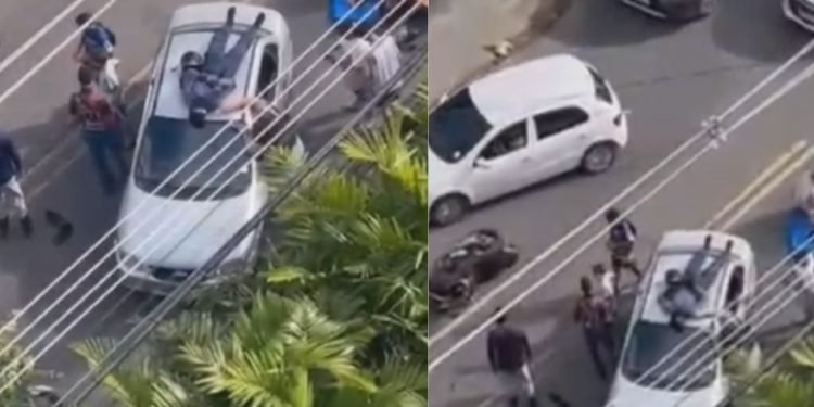 Motociclista 'voa' em acidente e vai parar no teto de carro em Manaus; foi socorrido com vida