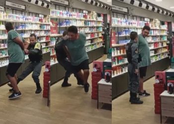 Com pequena estatura, PM se frustra ao tentar derrubar preso maior que ele dentro de loja em Manaus; VÍDEO