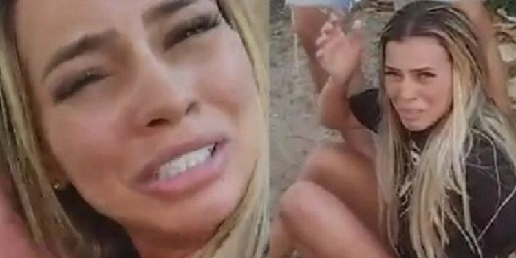Vídeo: mulher paquera traficante casado e leva corretivo com mangueira