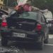 Vídeo: motoqueiro “voa” e vai parar em cima de carro após acidente em Manaus
