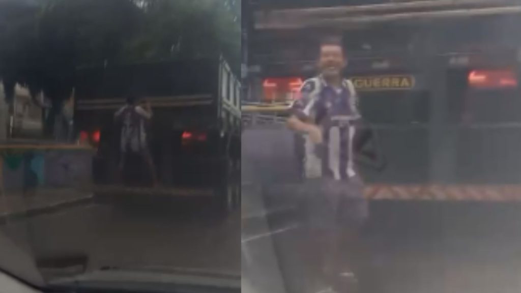 Vídeo mostra 'bebum' feliz da vida pegando carona pendurado na traseira de carreta na Compensa