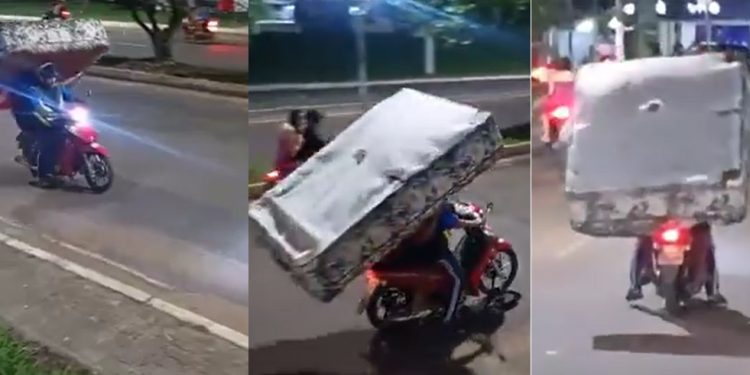 Vídeo: homem equilibra colchão de casal na cabeça em cima de moto no interior do Amazonas