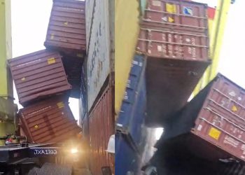 Vídeo urgente: pilha de contêineres cai sobre  caminhão com motorista dentro no Chibatão