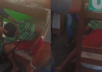 Com sono, homem aproveita cama exposta na frente da Apa Móveis e dorme; veja