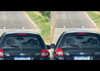Veja vídeo de casal fazendo saliência com carro em movimento na estrada