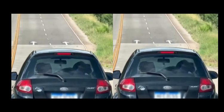 Veja vídeo de casal fazendo saliência com carro em movimento na estrada