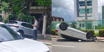 C0lisão entre veículos termina com carro cap0tado e outro destruind0 grade de condomínio no Parque 10