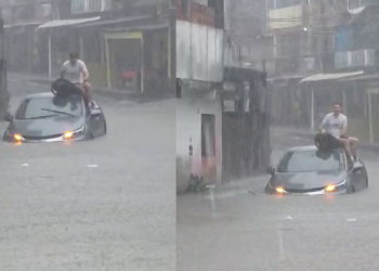 Vídeo: Homem escala próprio carro para escapar de alagamento em via em Manaus
