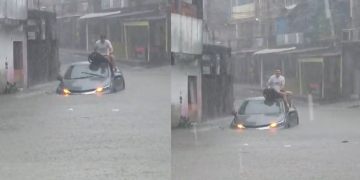 Vídeo: Homem escala próprio carro para escapar de alagamento em via em Manaus