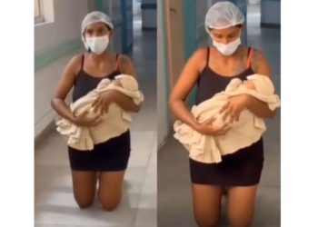 Mãe cumpre promessa e sai de joelhos com filho após alta hospitalar