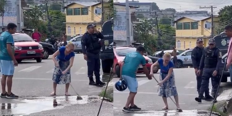 Vídeo triste: mãe de motoqueiro m0rto em acidente lava o sangue dele no asfalto em Manaus