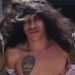Suspeito de m4t4r 16 pessoas tenta escapar de vestido e peruca, mas tatuagem o entrega